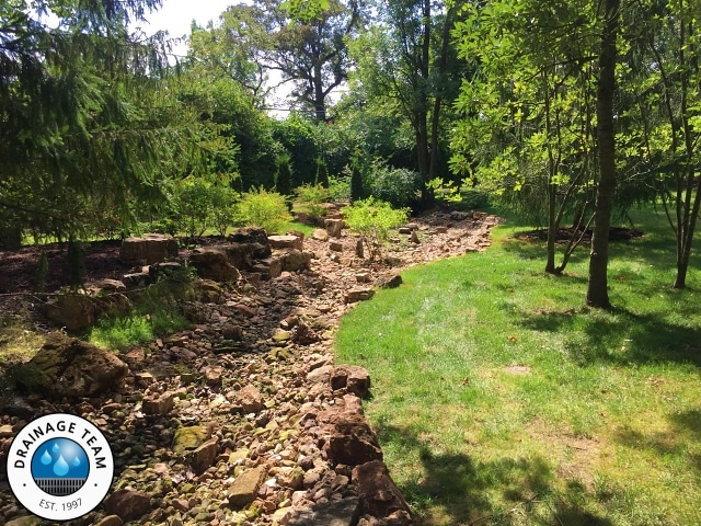 Dry Creek Bed Installation Ladue MO | Drainage Solutions