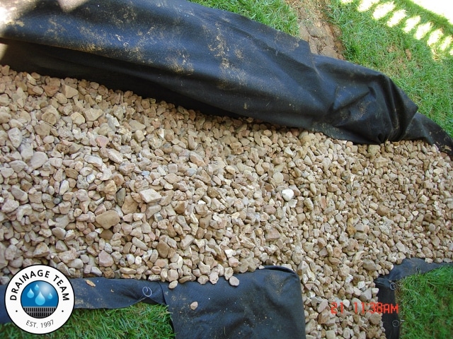 French Drain Rock Installation | Channel and Trench Drain Systems