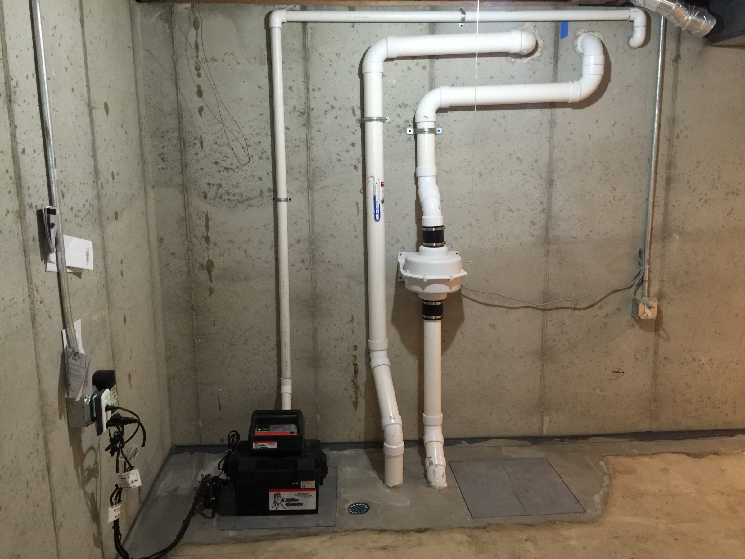 Basement sump pump and PVC drainage system