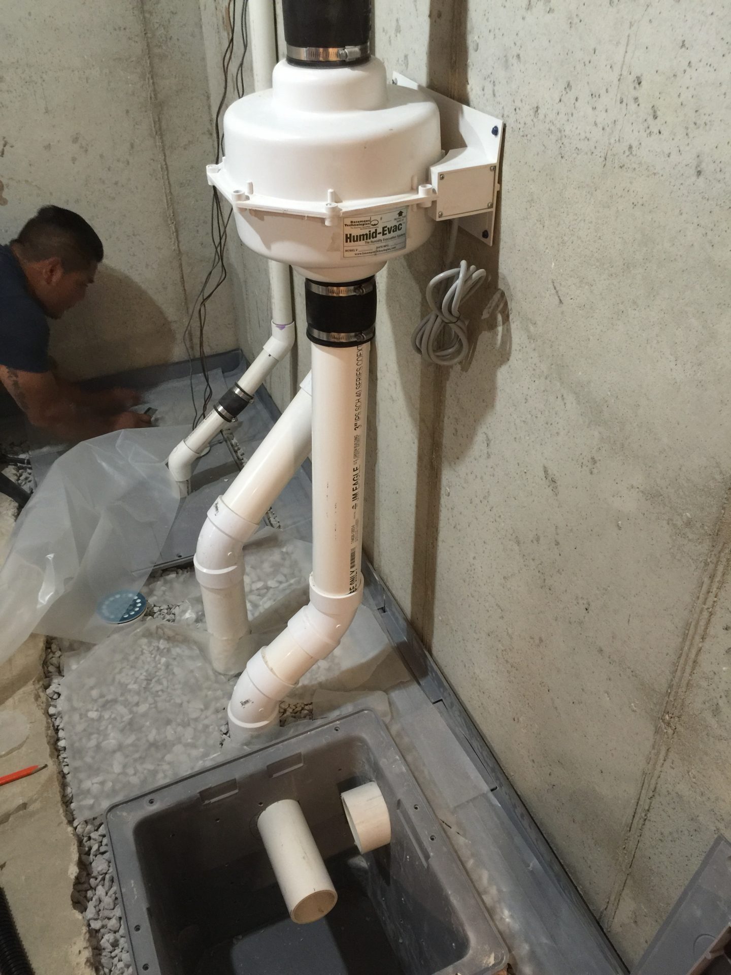 Basement humidifier ventilation system with PVC piping